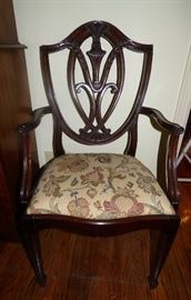 One of a pair of shield back arm chairs