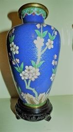 One of a pair of Cloisonne vases on stands