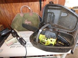 Poulan chain saw in case