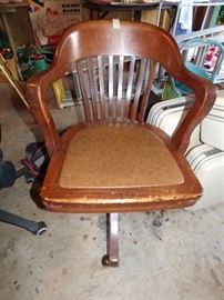 Vintage wooden rolling office chair