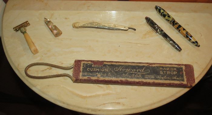 Sweet Antique lot here, Heyward Razor Strop with holder, Ivory Scrimshaw Straight Razor, His and Hers Antique Fountain Pens & more.