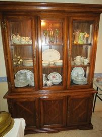 Beautiful Double Lighted China Cabinet with lower storage.