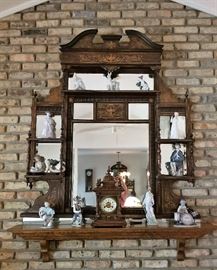 Beautiful antique wooden wall display shelves filled with Lladro