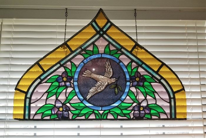 Several stained glass window pieces throughout the house