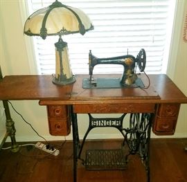 Antique SInger sewing machine in cabinet