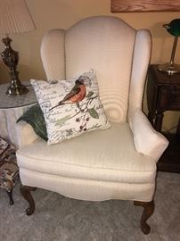 White upholstered armchair