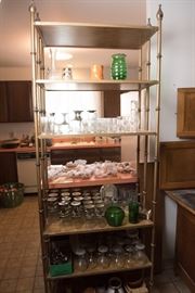 Assortment of Glassware On Mid Mod Shelving Rack