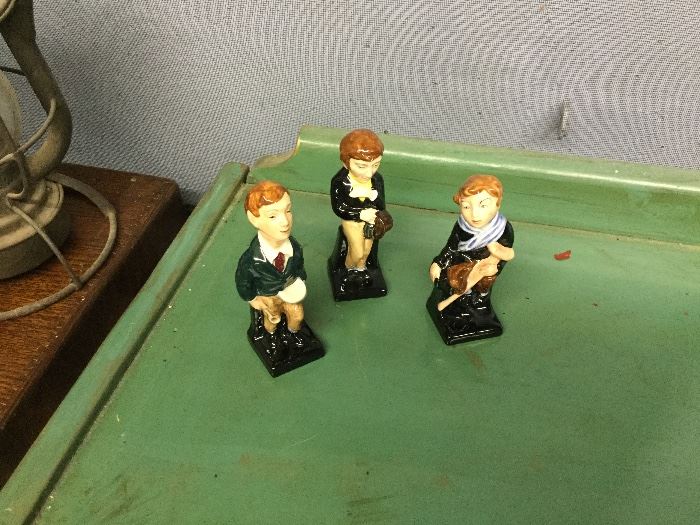Royal Doulton figures Tiny Tim, Oliver Twist, and David Cooperfield 