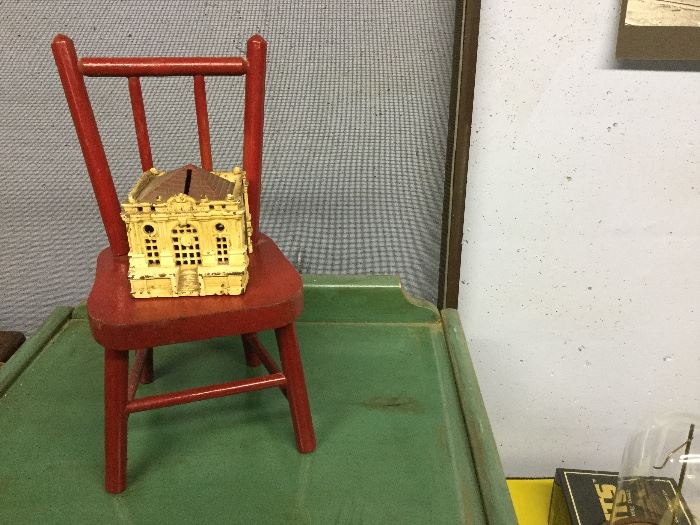 Little red doll chair with antique bank