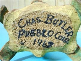 SIGNATURE ON CARVING