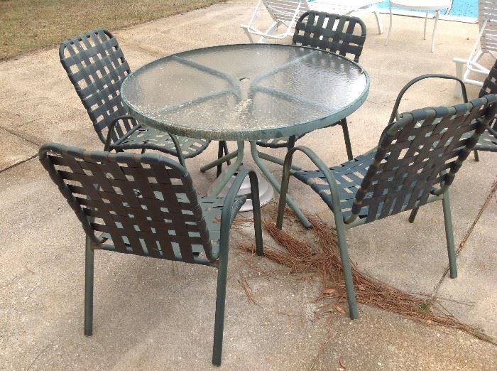 Outdoor Table / 4 Chairs $ 100.00
