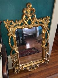 intricate gold gilt mirror