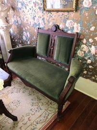 Victorian style green velvet antique love seat