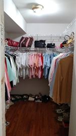 Very nice cloths sized med to x large. All cloths are $2 each in this closet. Purses and shoes marked separately 