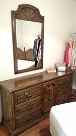 Dresser and Mirror. Mirror hangs on the wall