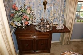 Silver plate tea set and buffet.  Very pretty porcelain candle sticks