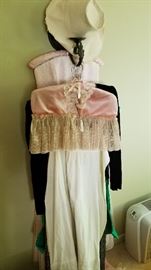 Lots of frilly vintage ladies clothing. Complete outfits available.