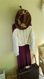Lots of frilly vintage ladies clothing. Complete outfits available.