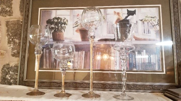 Large decorative goblets and lots of wall art