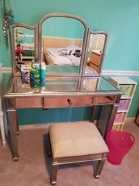 Mirrored vanity with bench