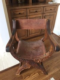 Pair of carved antique Brazilian campaign chairs. 