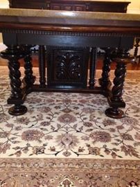 The dining table base measures 24 inches wide x 81 inches long. It is ornately carved with barley twist legs. 