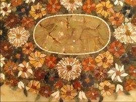 Dining table top of custom inlaid Brazilian stones including garnet, lapis, and onyx. 