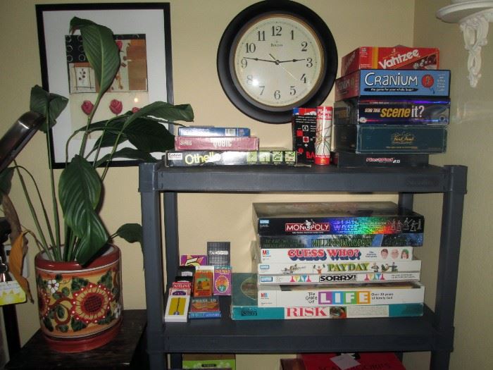 Living Room: Games-Monopoly-Sorry-Pay Day, Clock, Plant Stand, Plant, Cranium,