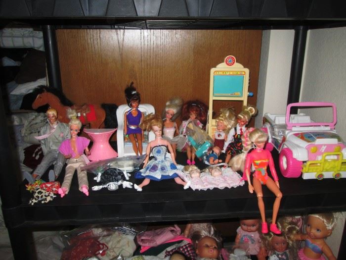 Upstairs 2nd Center Bedroom Left: Barbies, Jeep, Ken, Stuff