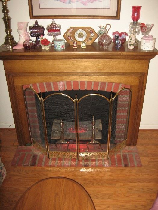Nicest faux fireplace I've seen, wonderful mantle and electric logs. 