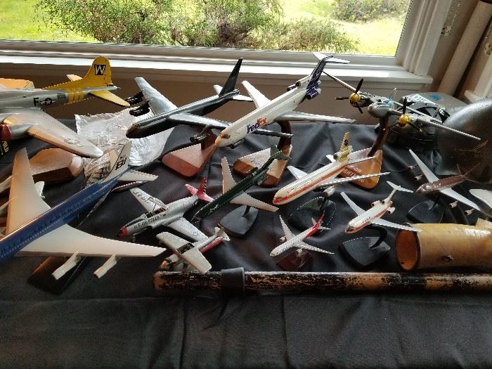 Large collection of plastic & wooden plane displays 