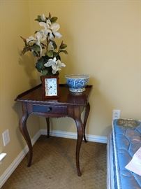 Drexel Heritage table, magnolia floral, clock, blue/white bowl