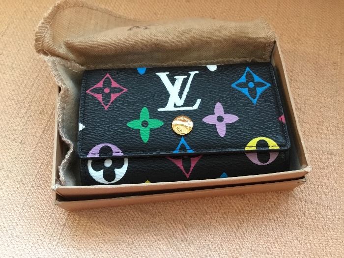 Louis Vuitton key case.  New in box