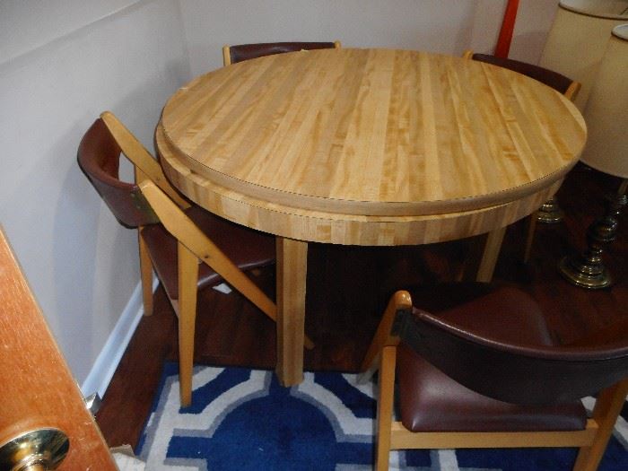 Butcher Block Game Table. Top Can be Removed. Under neath Bumper Pool, with Sticks and Bumper Balls. Other Side Card Poker Gaming. 4 Butcher Block Leather Tufted Side Chairs