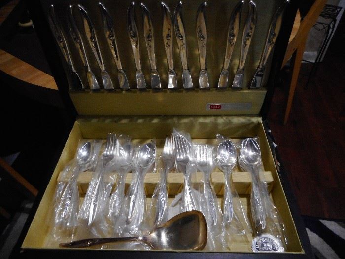1847 Rogers Bros..Never Used..all in plastic. 12 Piece Place Setting, Plus Service/Chest  Stainless 