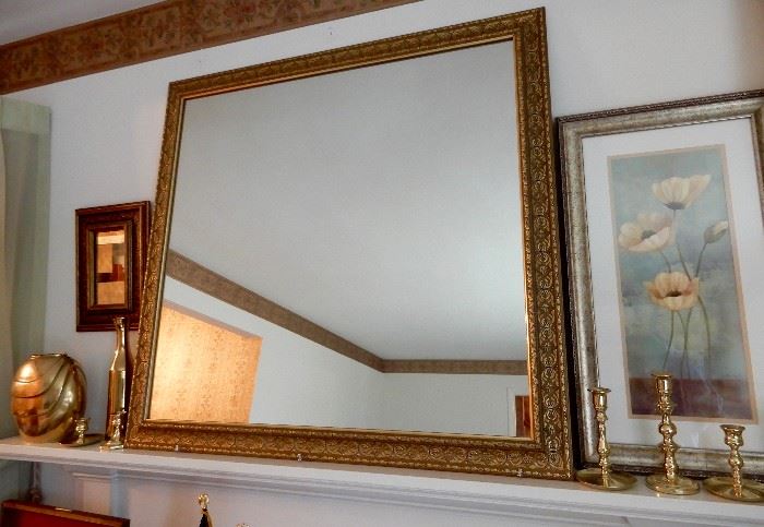 A GREAT GOLD LEAF MIRROR AND BALDWIN CANDLE STICKS