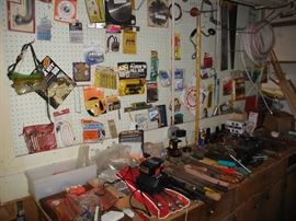 Many more tools are outside in garage area, but inside has a work bench and quite a bit of hardware and selection of tools.....
