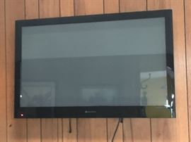 There are two flatscreen TVs