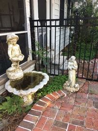 A large collection of cement yard art