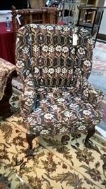Wing back chair with tapestry cover to be sold. 