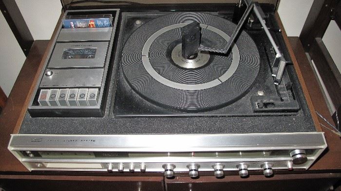 Radio plus cassette, 8 track and turntable. 