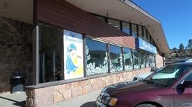 The Place and Epic Premier outside