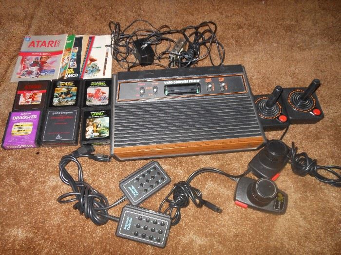 Vintage Atari gaming console and games