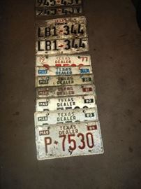 Vintage license plates including dealer tags 
