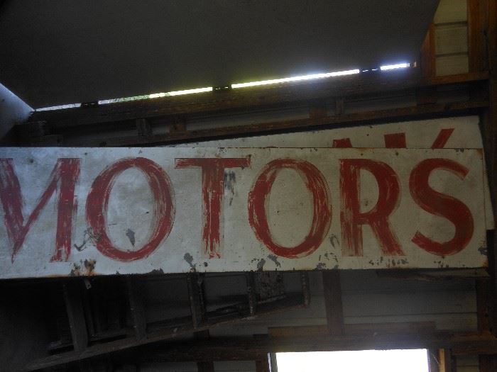 Vintage metal motor company signs