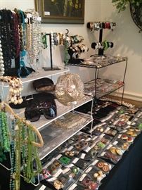 More jewelry, sunglasses, and evening bags