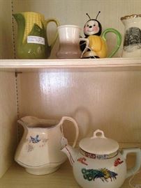 Variety of teapots and pitchers