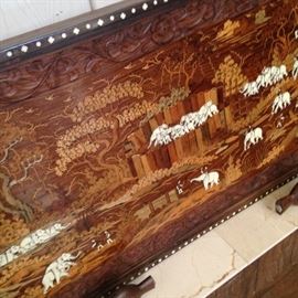 Carved African scene table
