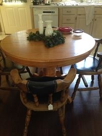 Breakfast table and 4 chairs (in the kitchen of the mother-in-law suite)