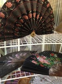 Numerous fans collected from travels